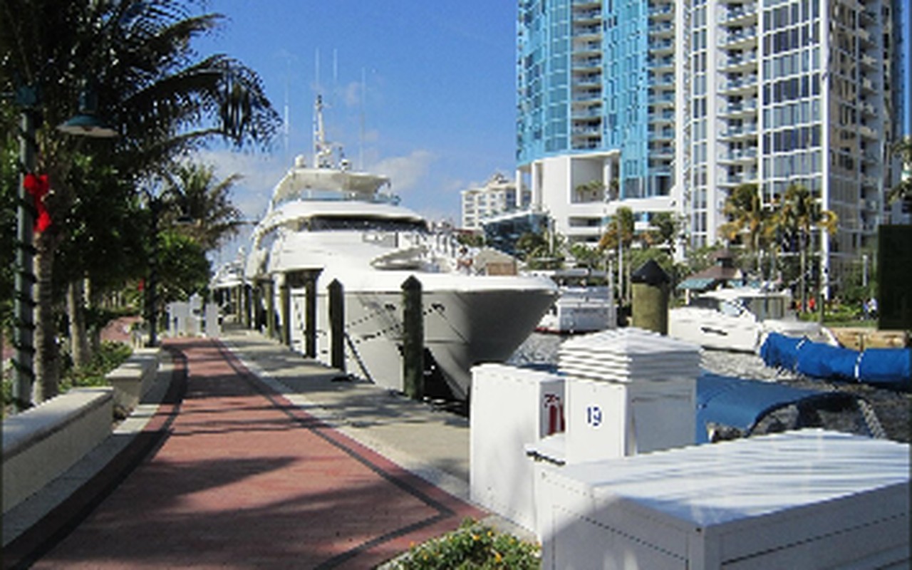 Yachts along a downtown Fort Lauderdale waterfront promenade